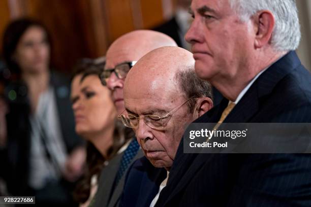 Commerce Secretary Wilbur Ross nods off next to U.S. Secretary of State Rex Tillerson during a news conference with U.S. President Donald Trump and...