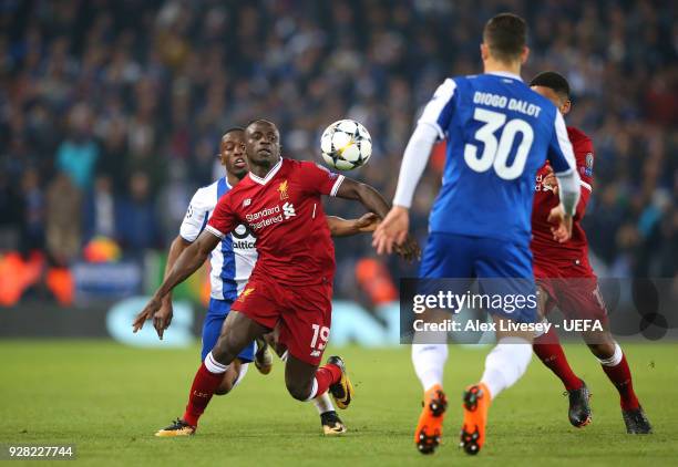 Sadio Mane of Liverpool takes on Diogo Dalot of FC Porto during the UEFA Champions League Round of 16 Second Leg match between Liverpool and FC Porto...
