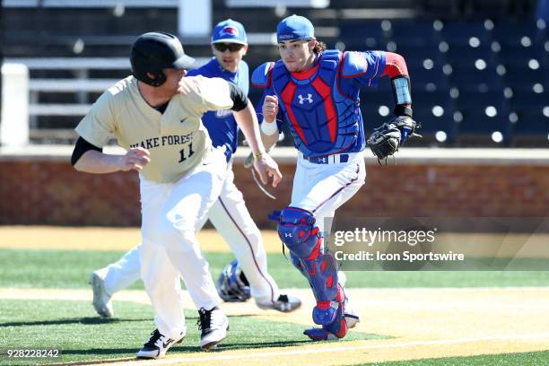 UMass Lowell's Steve Passatempo runs down Wake Forest's Shane Muntz . The Wake Forest University Demon Deacons hosted the UMass Lowell River Hawks on...