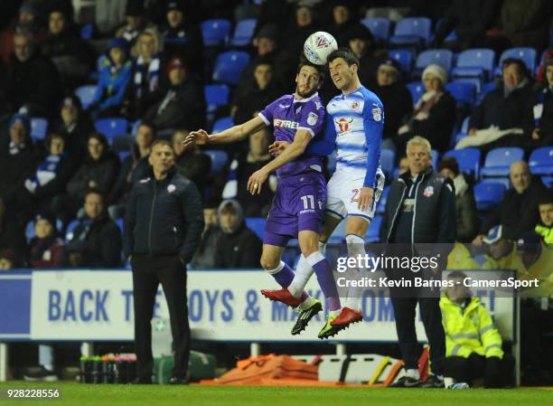 Bolton Wanderers' Will Buckley vies for possession with Reading's Pelle Clement during the Sky Bet Championship match between Reading and Bolton...