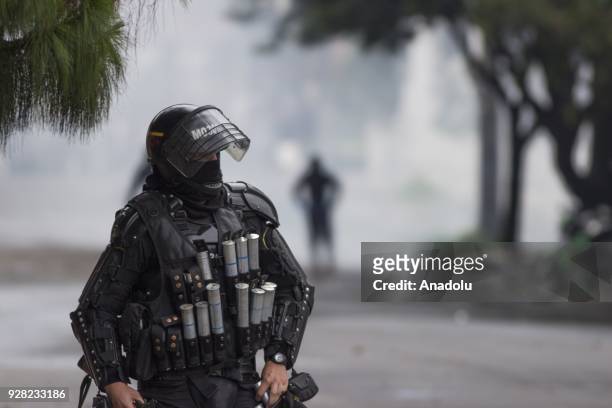 Riot police attempt to disperse protestors after clashes broke out between students and riot police during a protest due to dissatisfaction of...