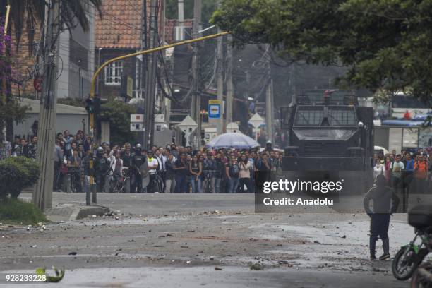 Riot police attempt to disperse protestors after clashes broke out between students and riot police during a protest due to dissatisfaction of...