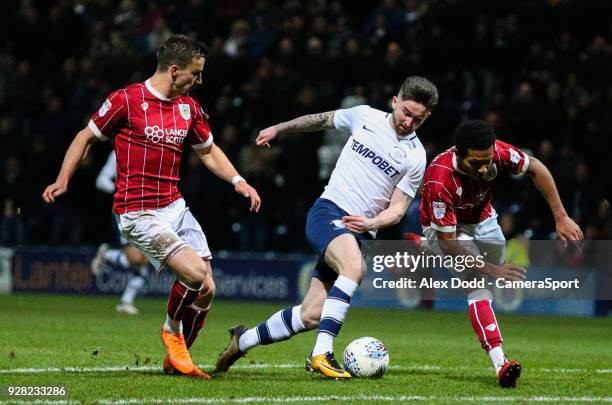 Preston North End's Sean Maguire beats Bristol City's Joe Bryan and Korey Smith before slotting the winning goal during the Sky Bet Championship...