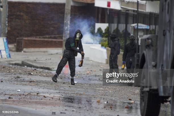 Protestors clash with riot police after clashes broke out between students and riot police during a protest due to dissatisfaction of educational...