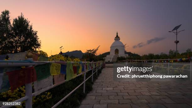 shanti stupa or peace pagoda in twilight. - シャンティストゥーパ ストックフォトと画像