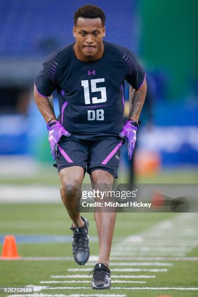 Central Florida defensive back Mike Hughes runs through a drill during the NFL Scouting Combine at Lucas Oil Stadium on March 5, 2018 in...