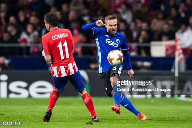 Pierre Bengtsson of FC Copenhague fights for the ball with Angel Correa of Atletico de Madrid during the UEFA Europa League 2017-18 Round of 32 match...