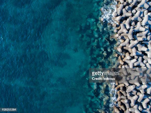 the sea of tetrapod and emerald green. - ship's bridge stock pictures, royalty-free photos & images