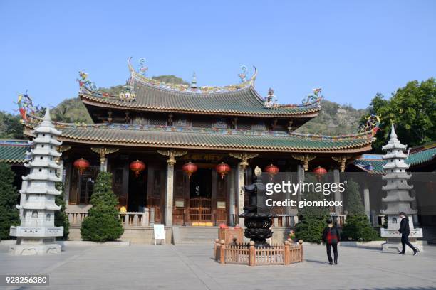 heaven king hall, nanputuo temple in xiamen, fujian province, china - south putuo temple stock pictures, royalty-free photos & images