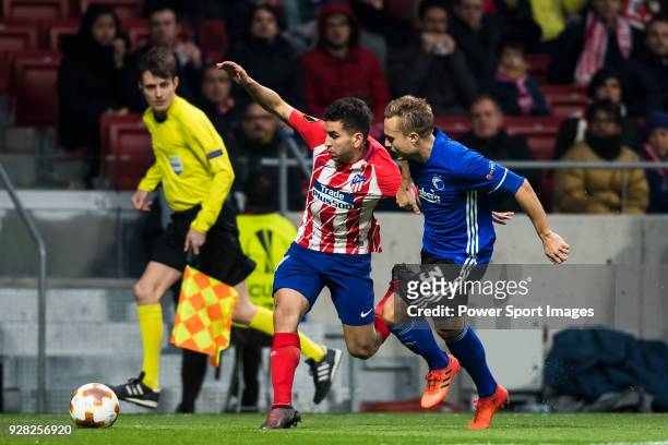 Angel Correa of Atletico de Madrid battles for the ball with Pierre Bengtsson of FC Copenhague during the UEFA Europa League 2017-18 Round of 32...