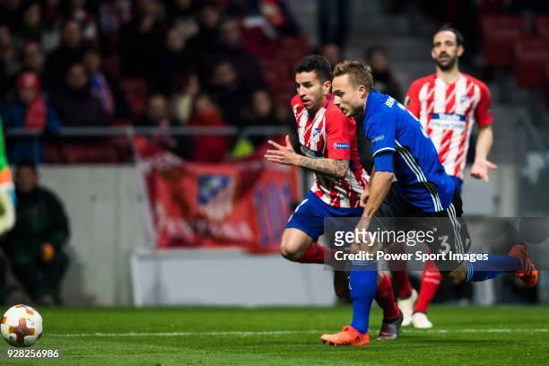 Angel Correa of Atletico de Madrid fights for the ball with Pierre Bengtsson of FC Copenhague during the UEFA Europa League 2017-18 Round of 32 match...