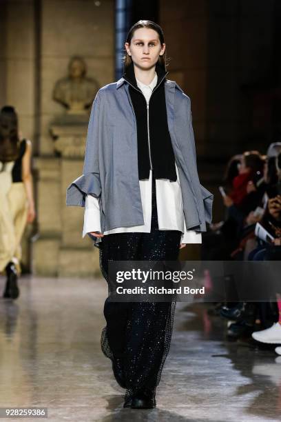 Model walks the runway during the Moon Young Hee show as part of the Paris Fashion Week Womenswear Fall/Winter 2018/2019 on March 6, 2018 in Paris,...