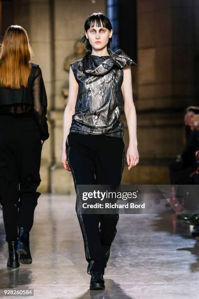 Model walks the runway during the Moon Young Hee show as part of the Paris Fashion Week Womenswear Fall/Winter 2018/2019 on March 6, 2018 in Paris,...