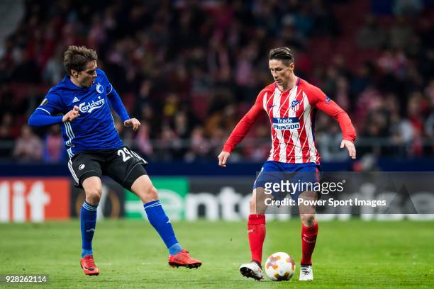 Fernando Torres of Atletico de Madrid is tackled by Robert Skov of FC Copenhague during the UEFA Europa League 2017-18 Round of 32 match between...