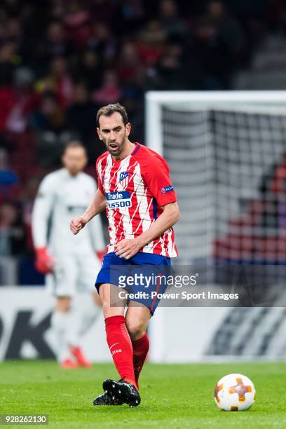 Diego Roberto Godin Leal of Atletico de Madrid in action during the UEFA Europa League 2017-18 Round of 32 match between Atletico de Madrid and FC...