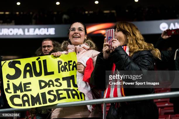 Saul Niguez Esclapez of Atletico de Madrid's fans show their supports during the UEFA Europa League 2017-18 Round of 32 match between Atletico de...