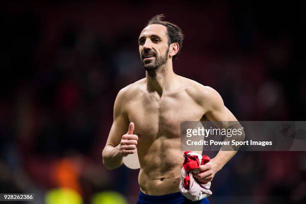Juan Francisco Torres Belen, Juanfran, of Atletico de Madrid takes off his shirt after the UEFA Europa League 2017-18 Round of 32 match between...