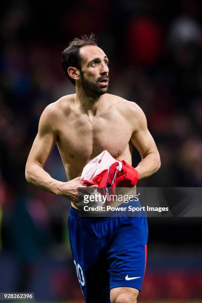 Juan Francisco Torres Belen, Juanfran, of Atletico de Madrid takes off his shirt after the UEFA Europa League 2017-18 Round of 32 match between...