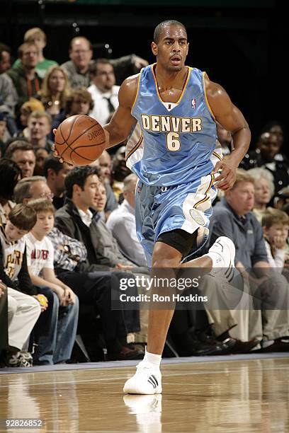 Arron Afflalo of the Denver Nuggets moves the ball up court during the game against the Indiana Pacers at Conseco Fieldhouse on November 3, 2009 in...