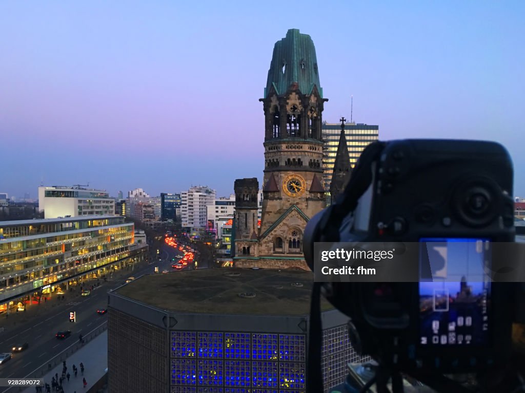Camera, taking a picture of the Kaiser-Wilhelm Memorial Church (Kaiser-Wilhelm-Gedächtnis-Kirche) - Berlin-Charlottenburg, Germany