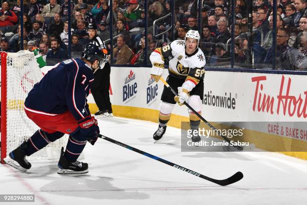 Jack Johnson of the Columbus Blue Jackets attempts to block the passing lane from Erik Haula of the Vegas Golden Knights during the second period of...