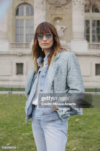 French model, Caroline de Maigret seen at the Chanel fashion show during Paris Fashion Week Womenswear Fall/Winter 2018/2019 on March 6, 2018 in...