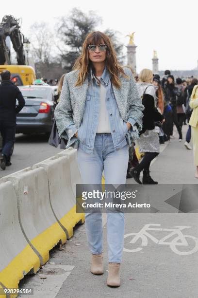 French model, Caroline de Maigret seen at the Chanel fashion show during Paris Fashion Week Womenswear Fall/Winter 2018/2019 on March 6, 2018 in...