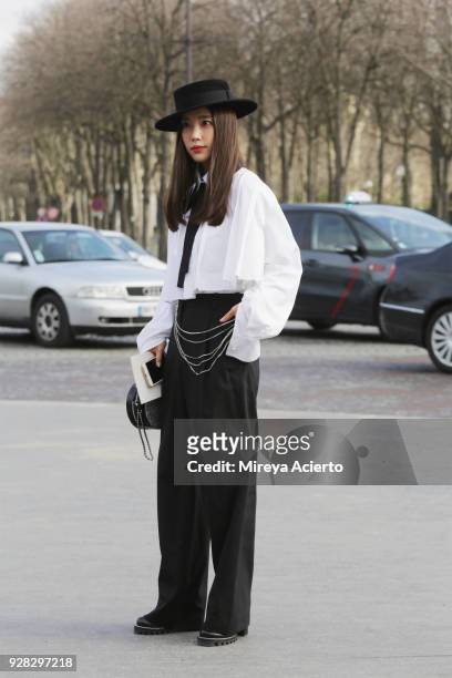 Lifestyle influencer, Kieunse, seen at the Chanel fashion show during Paris Fashion Week Womenswear Fall/Winter 2018/2019 on March 6, 2018 in Paris,...