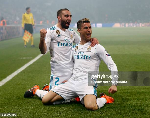 Cristiano Ronaldo of Real Madrid celebrates after scoring With Daniel Carvajal during the UEFA Champions League Round of 16 Second Leg match between...