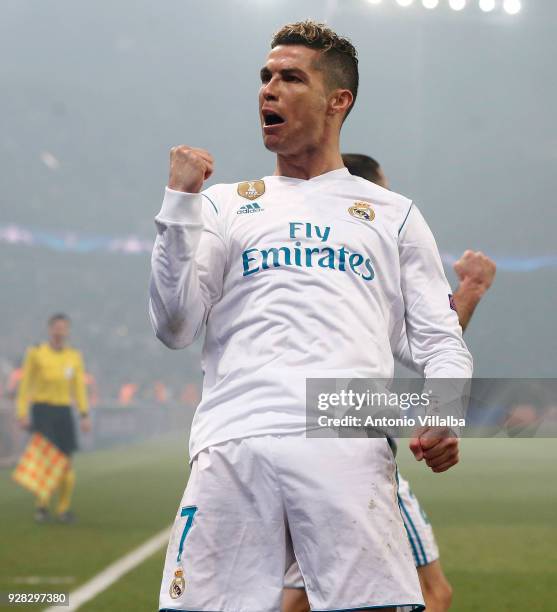 Cristiano Ronaldo of Real Madrid celebrates after scoring during the UEFA Champions League Round of 16 Second Leg match between Paris Saint-Germain...