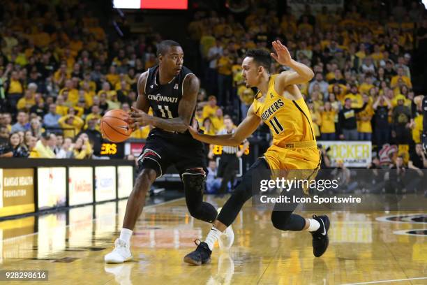 Cincinnati Bearcats forward Gary Clark is guared by Wichita State Shockers guard Landry Shamet in the first half of an American Athletic Conference...