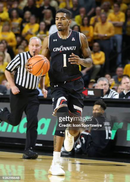 Cincinnati Bearcats guard Jacob Evans brings the ball upcourt in the first half of an American Athletic Conference matchup between the 10th ranked...