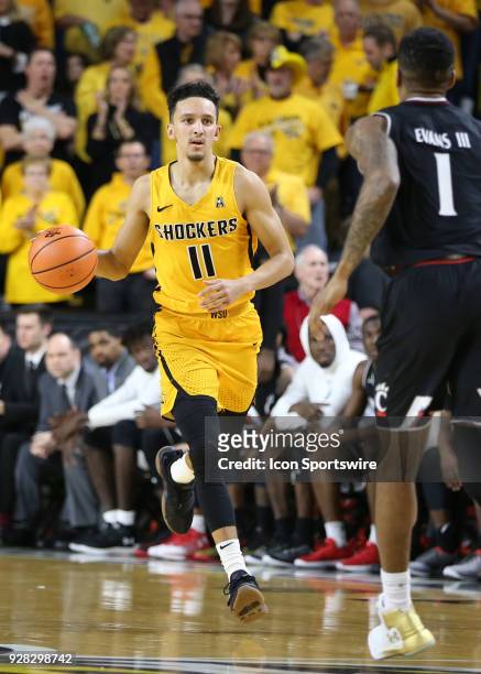 Wichita State Shockers guard Landry Shamet brings the ball upcourt in the second half of an American Athletic Conference matchup between the 10th...