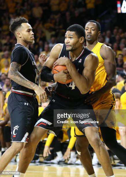 Cincinnati Bearcats forward Kyle Washington secures the rebound in the second half of an American Athletic Conference matchup between the 10th ranked...