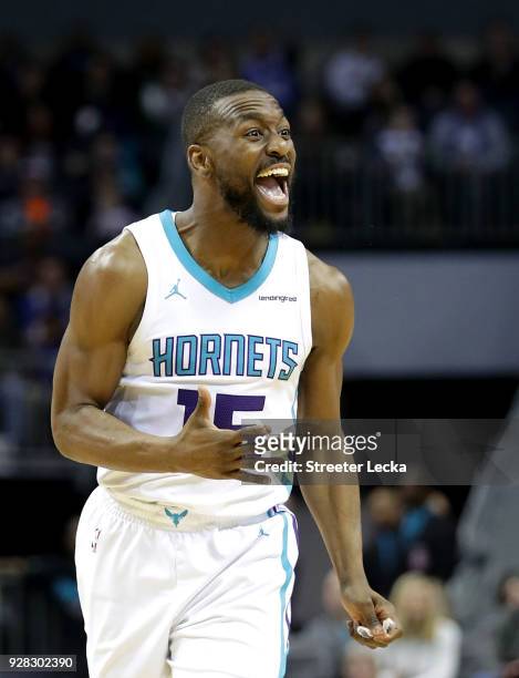 Kemba Walker of the Charlotte Hornets reacts after a play against the Philadelphia 76ers during their game at Spectrum Center on March 6, 2018 in...