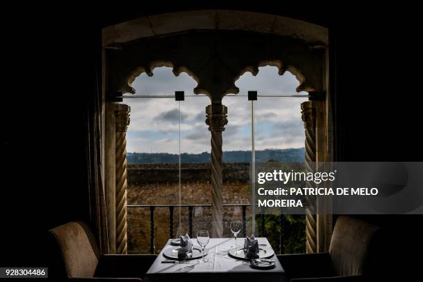 Table is laid by a window of the rstaurant of the 'Pousada do Castelo' inn located in the medieval town of Obidos, central Portugal, on February 9,...