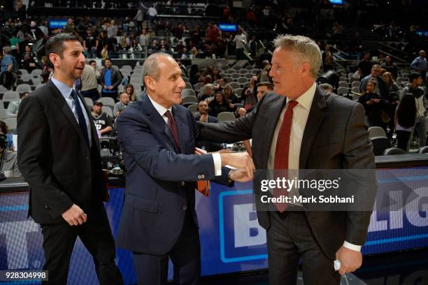 Coach Ettore Messina of the San Antonio Spurs speaks with Head Coach Brett Brown of the Philadelphia 76ers after the game on January 26, 2018 at the...