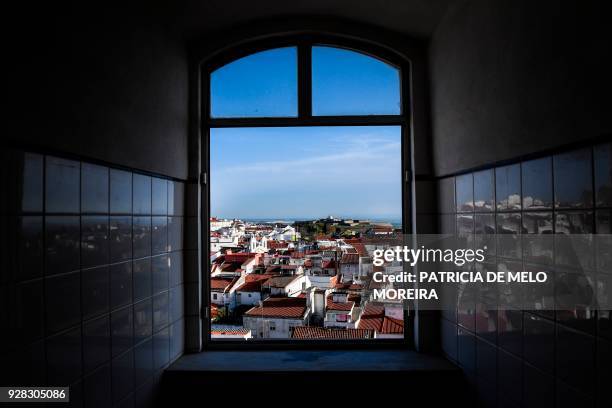 The town of Elvas, in Alentejo is pictured through a window of a former convent and military court to be restored to a luxury hotel on January 30,...