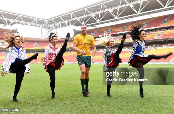 Izack Rodda enjoys a dance with Irish dancers during a Rugby Australia media opportunity at Suncorp Stadium on March 7, 2018 in Brisbane, Australia....