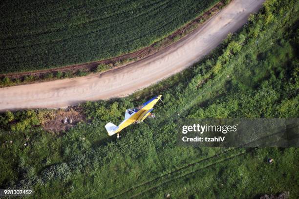 looking down on a crop duster - center pivot irrigation stock pictures, royalty-free photos & images