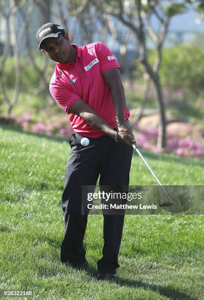 Chawrasia of India chips onto the 9th green during a practice round ahead of the Hero Indian Open at Dlf Golf and Country Club on March 7, 2018 in...