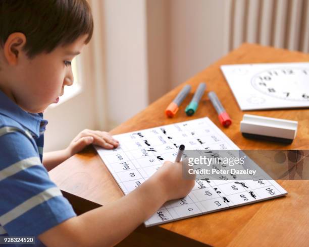 boy learning to write - writing copy stock pictures, royalty-free photos & images