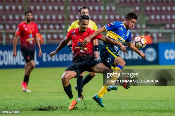 Patricio Rubio of Chile's Everton, vies for the ball with Jesus Arrieta of Venezuela's Caracas FC, during their Copa Sudamericana 2018 football match...