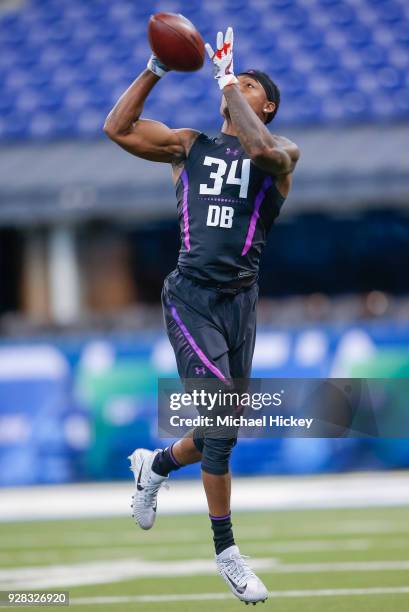 Virginia Tech defensive back Greg Stroman participates in a drill during the NFL Scouting Combine at Lucas Oil Stadium on March 5, 2018 in...