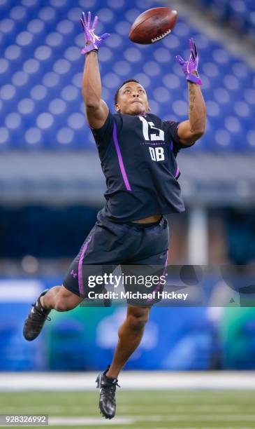 Central Florida defensive back Mike Hughes participates in a drill during the NFL Scouting Combine at Lucas Oil Stadium on March 5, 2018 in...