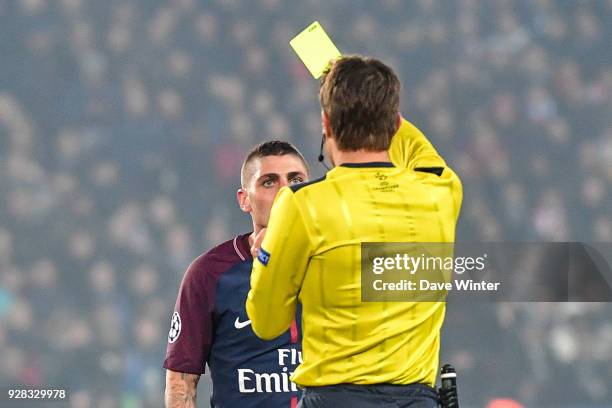 Marco Verratti of PSG receives a second yellow card from referee Felix Brych, so hence a red card, during the UEFA Champions League Round of 16...