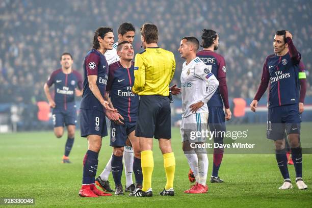 Marco Verratti of PSG receives a second yellow card from referee Felix Brych, so hence a red card, during the UEFA Champions League Round of 16...