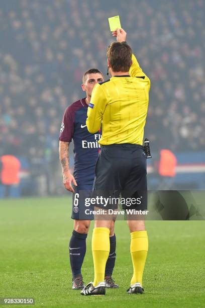 Marco Verratti of PSG receives a second yellow card from referee Felix Brych, so hence a red card, during the UEFA Champions League Round of 16...