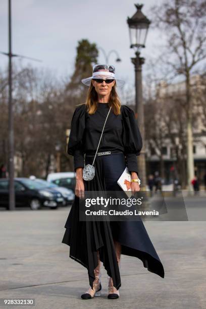 Guest, is seen in the streets of Paris before the Chanel show during Paris Fashion Week Womenswear Fall/Winter 2018/2019 on March 6, 2018 in Paris,...