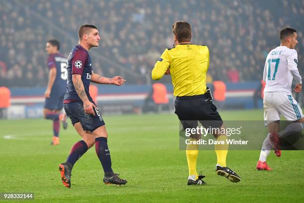 Marco Verratti of PSG receives a second yellow card from referee Felix Brych, so hence a red card, during the UEFA Champions League Round of 16...